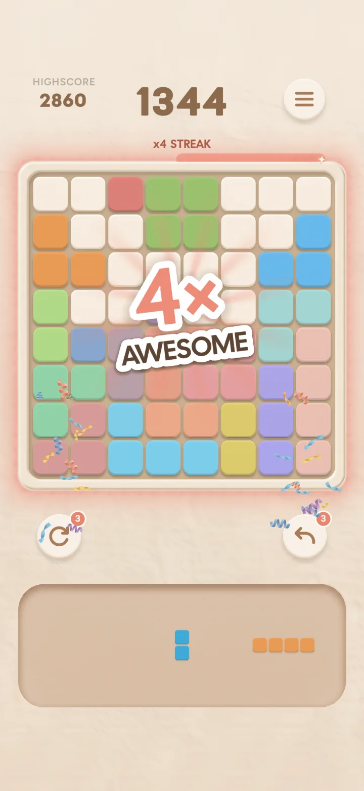 Bloxi on iPhone: a 4× Awesome combo clears four lines at once.